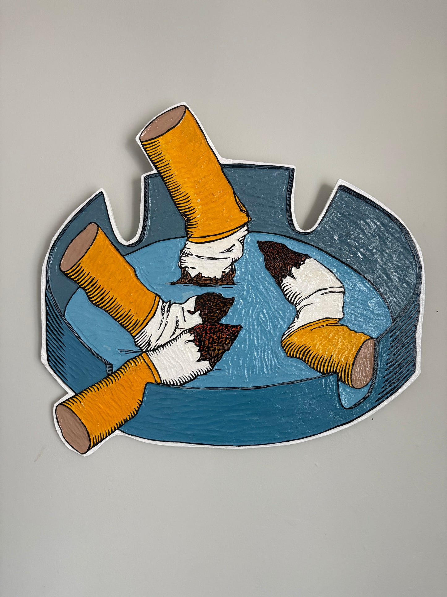 4 Cigarettes in an Ashtray